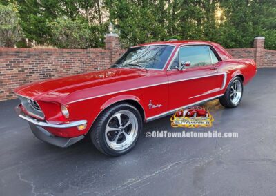1968 Ford Mustang coupe in Candy Apple Red