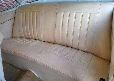 1955 Chevrolet Sedan in Yellow and White - interior backseat