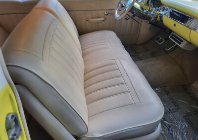 1955 Chevrolet Sedan in Yellow and White - interior front seat
